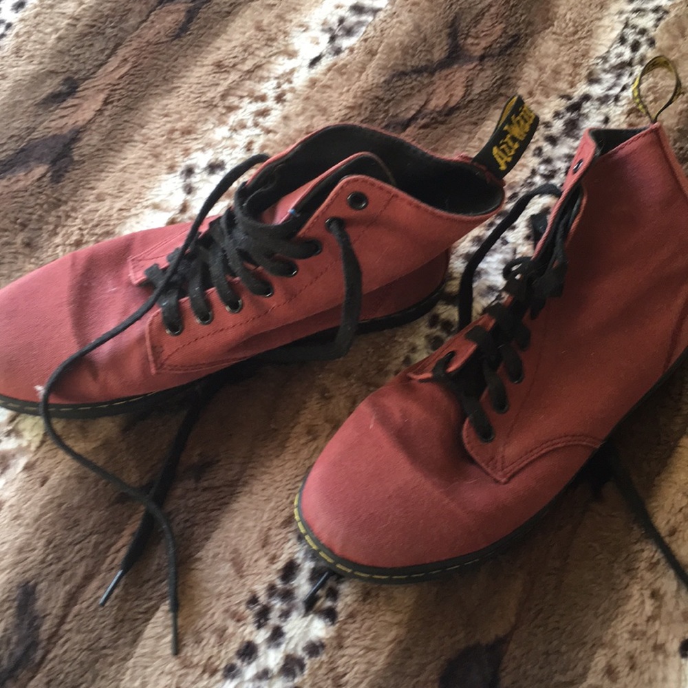 Burgundy doc martens and sutra curler